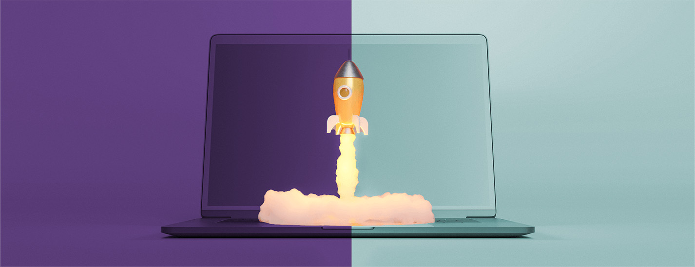 Two tone blue and purple split screen with rocket ship displayed on an open laptop