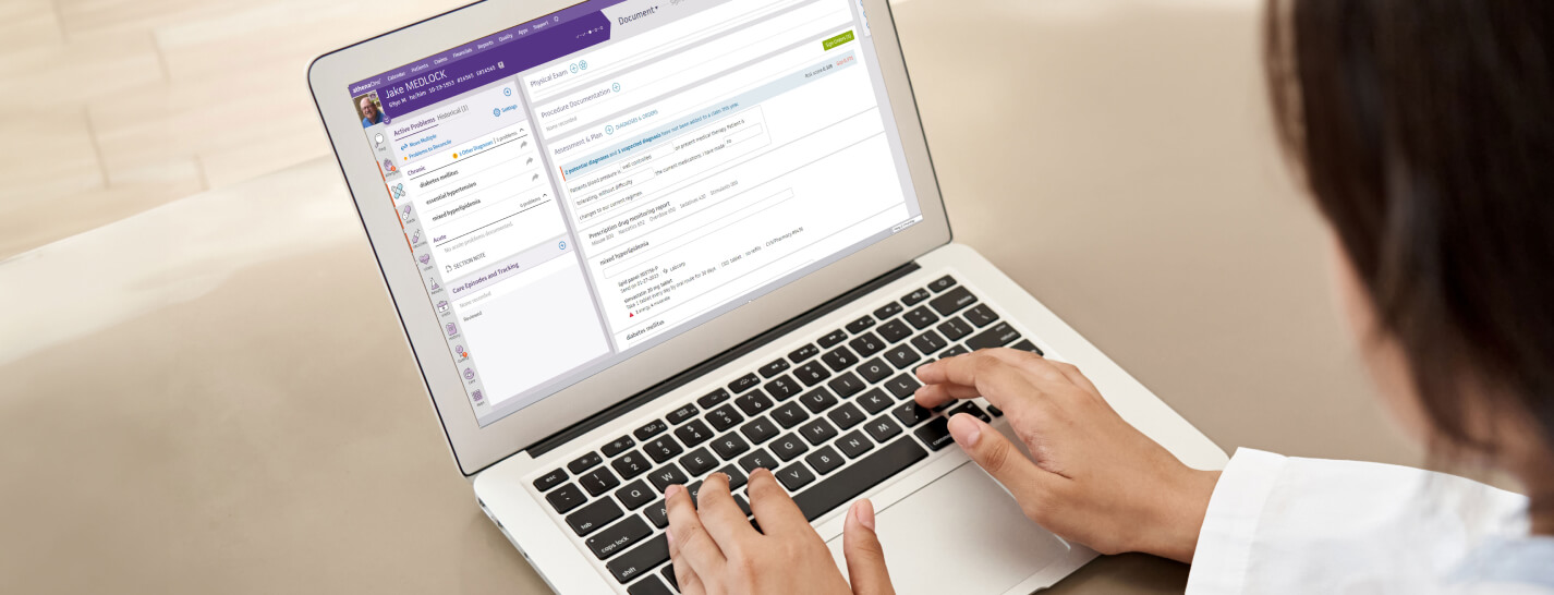 Doctor using athenaOne ehr software