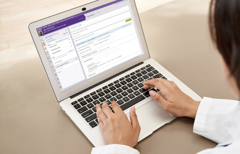 Doctor using athenaOne ehr software