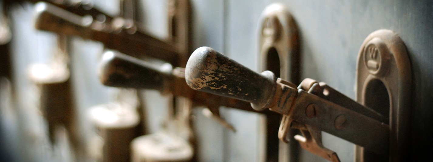 photograph of wooden levers