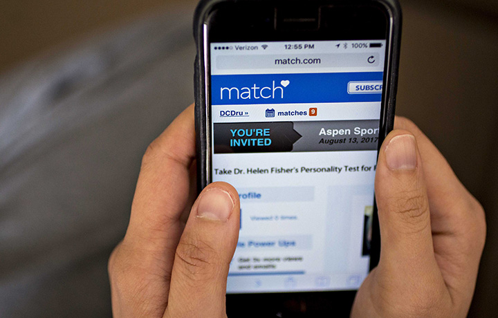Image of a smartphone with the Match.com application running