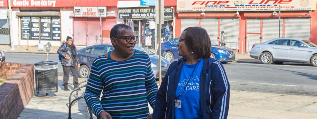 Photograph of Phyllis Jones Carter, a patient, left, with UPenn community health worker Cherlynne Graham Seay, right.