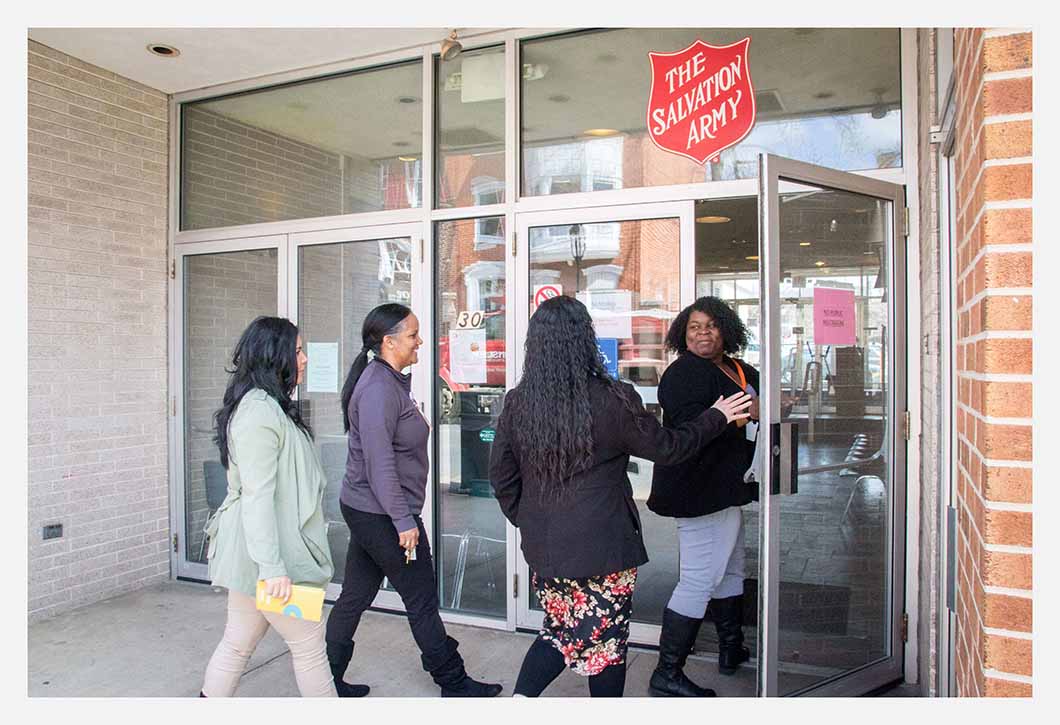 Women walking into Salvation Army.