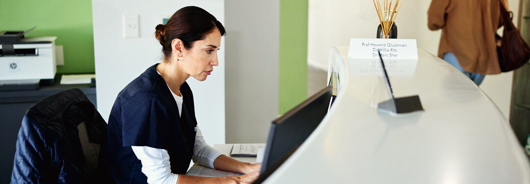 Clinician verifying AI-powered labels automatically that are applied to external faxes.