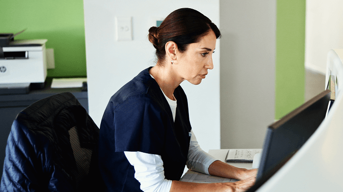 Clinician verifying AI-powered labels automatically that are applied to external faxes.