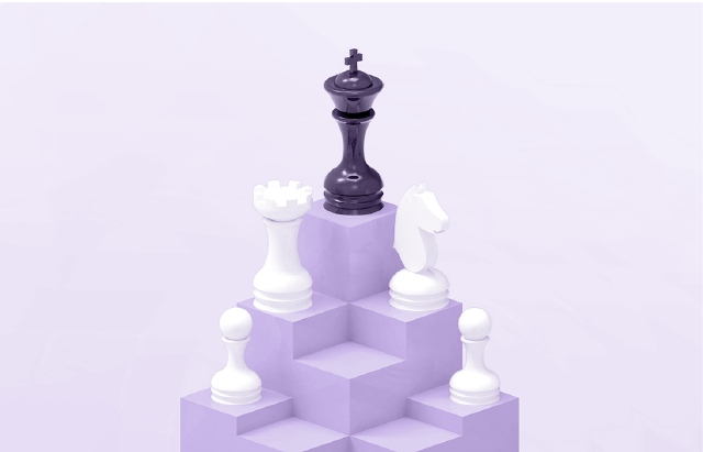 Chess piece atop building blocks in light purple