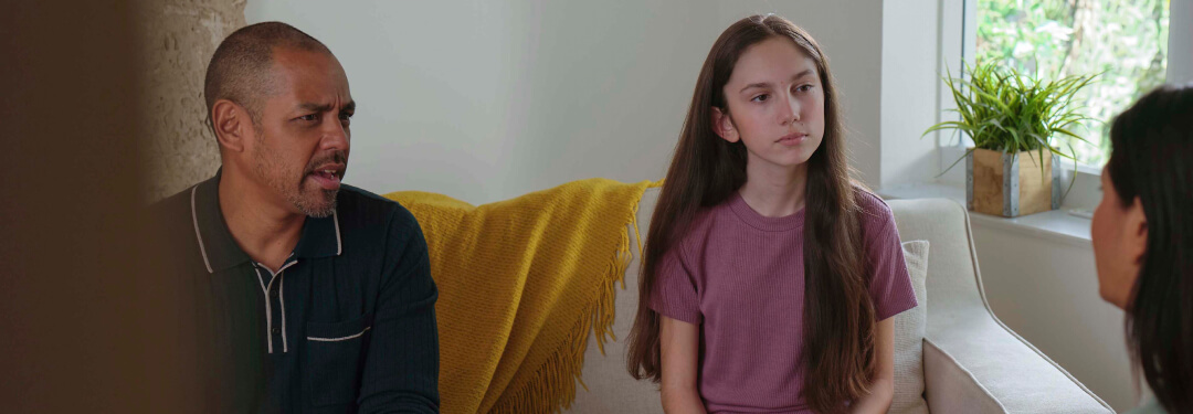 mental health session in progress with man and young woman