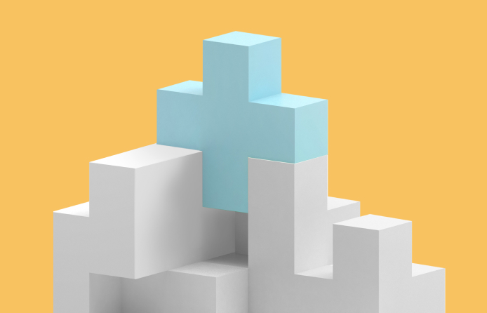 white building blocks with a blue hospital cross at the top, yellow background