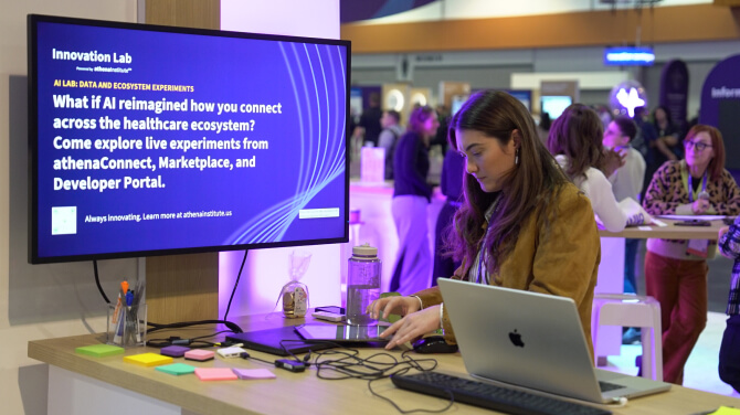 A clinician participating in AI Innovation Lab discussions during the athenahealth Thrive event.