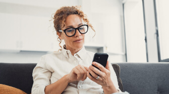 Physician uses their phone to help calculate MIPS score.