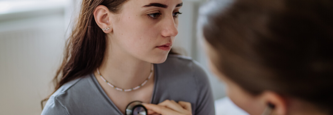 Female patient being seen by her primary care doctor