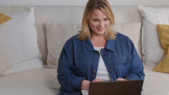 Patient at home viewing her medical records through patient portal