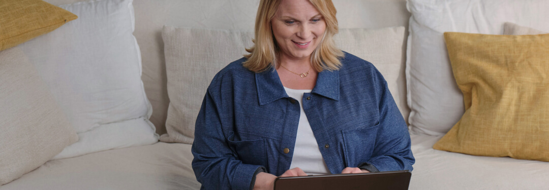 Patient at home viewing her medical records through patient portal