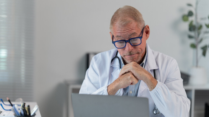 Clinician looking at an AI-generated summary in the patient chart to assist documentation.