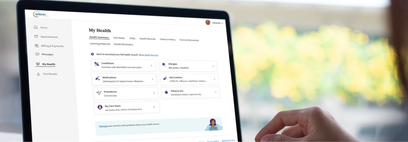 A patient accesses their patient portal and views their health summary on their laptop.
