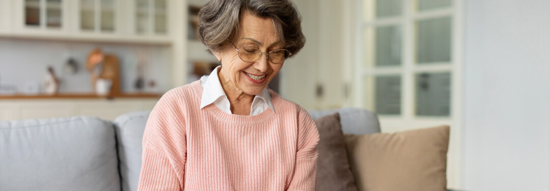 Older patient trying wearable health, medical tracker