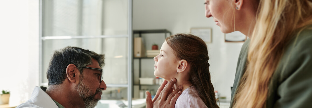Doctor examines patient during check-up