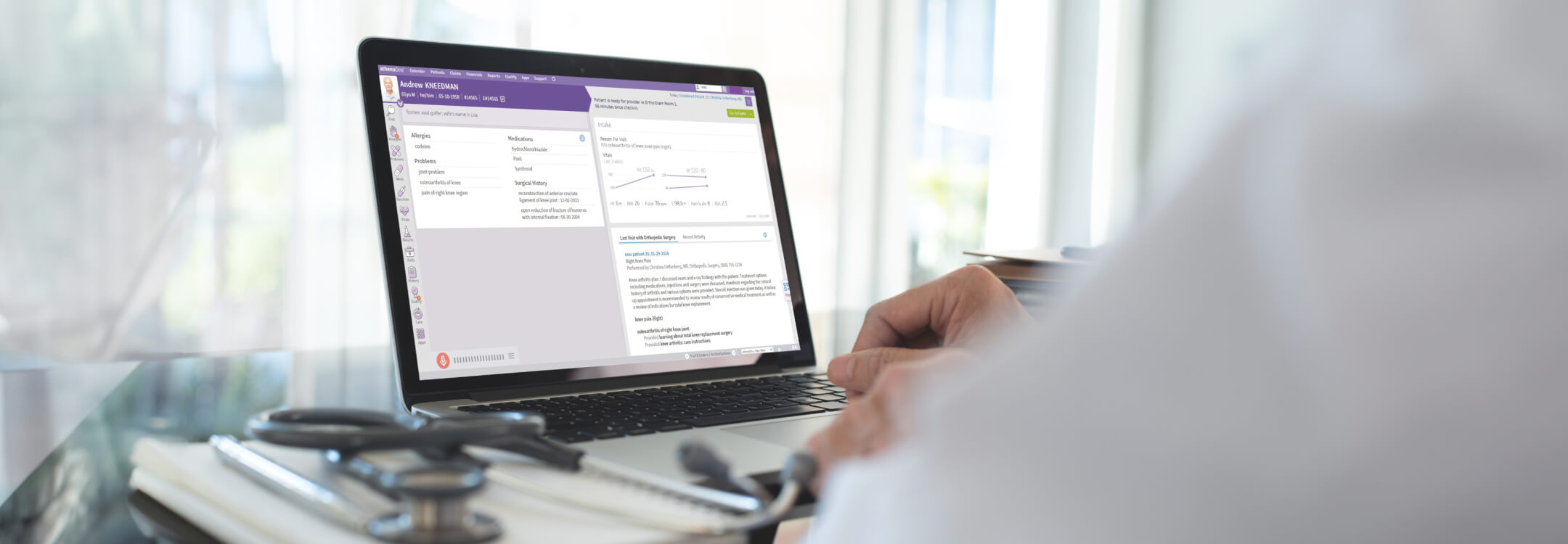 athenaOne software shown on laptop