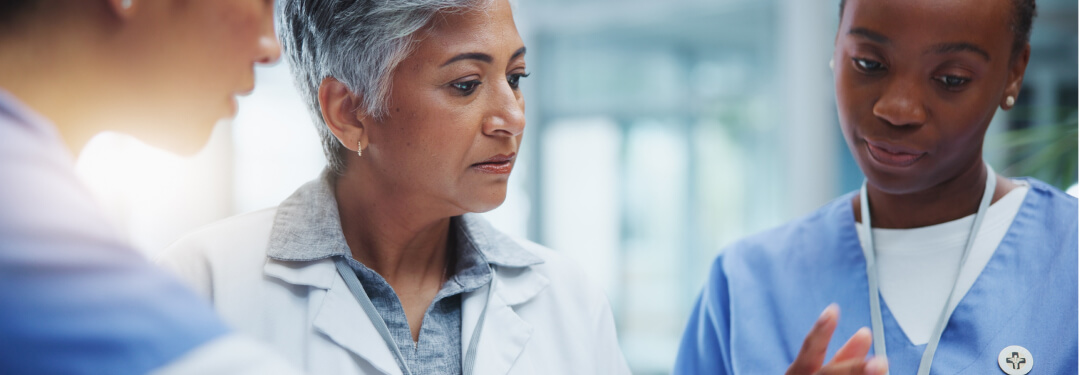 Clinicians reviewing electronic health records on athenaOne.